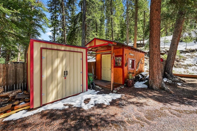 27802 Shadow Mountain Dr, Conifer, CO 80433 - snow covered structure with a storage unit