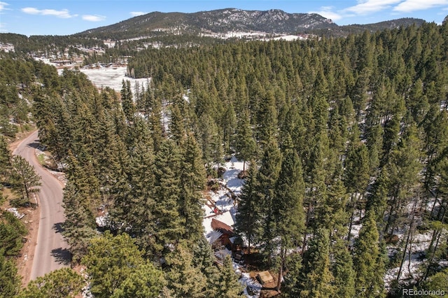 27802 Shadow Mountain Dr, Conifer, CO 80433 - view of property location featuring a mountainous background and a heavily wooded area