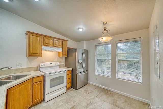 kitchen featuring stainless steel refrigerator with ice dispenser, pendant lighting, a healthy amount of sunlight, and white electric stove