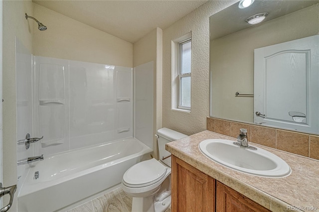 full bathroom with toilet, shower / bathing tub combination, a textured ceiling, and vanity