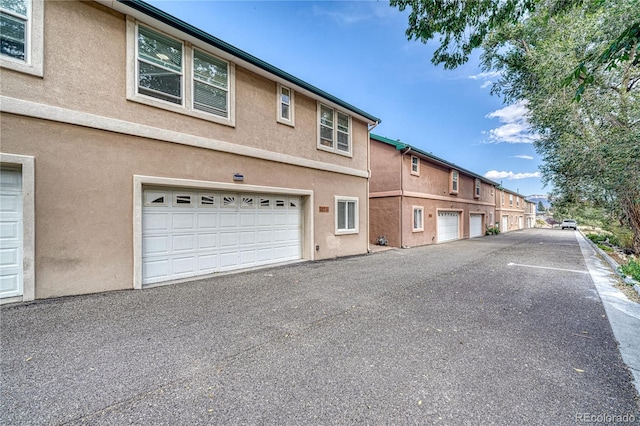 exterior space featuring a garage