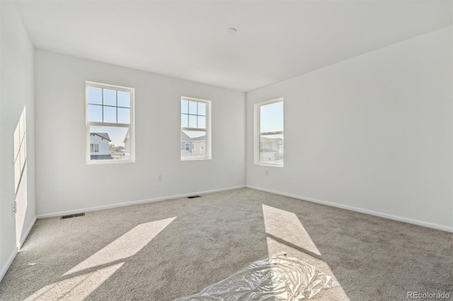 view of carpeted spare room