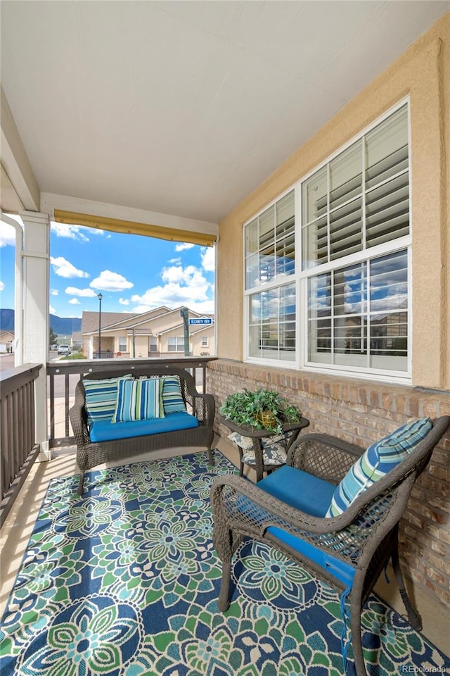 view of patio with a balcony