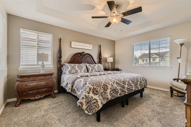 3120 Redhaven Way, Highlands Ranch, CO 80126 - bedroom with baseboards, carpet, ceiling fan, and a raised ceiling