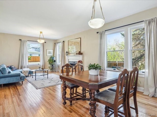 dining area with light wood finished floors