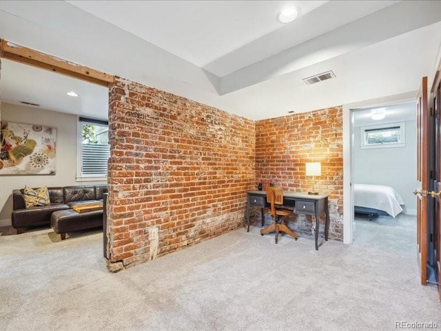 home office featuring carpet floors, brick wall, and recessed lighting