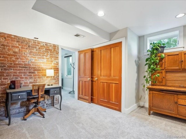 carpeted home office with baseboards