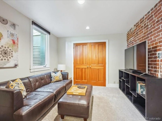 living area with carpet and recessed lighting