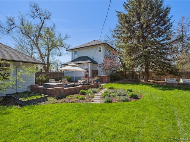 back of house featuring outdoor lounge area