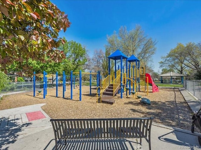 community jungle gym with fence