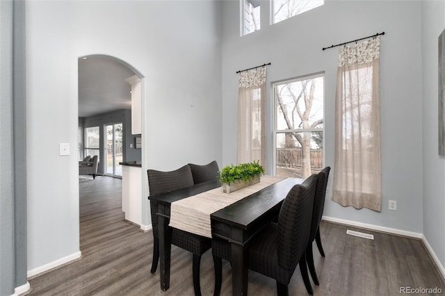 dining room with hardwood / wood-style flooring