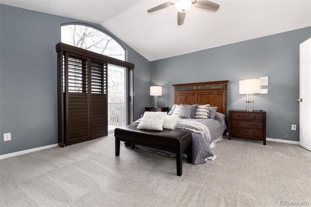 bedroom featuring ceiling fan, access to exterior, light carpet, and vaulted ceiling