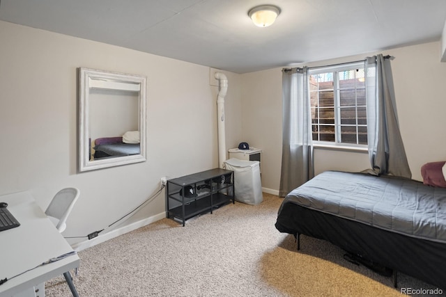 bedroom with light carpet