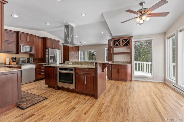 27987 Pine Grove Trl, Conifer, CO 80433 - kitchen with appliances with stainless steel finishes, island range hood, lofted ceiling, light wood-style flooring, and healthy amount of natural light