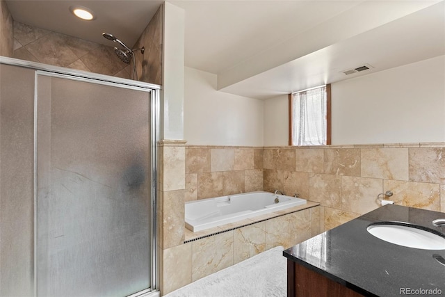 27987 Pine Grove Trl, Conifer, CO 80433 - full bath featuring a stall shower, a bath, and vanity
