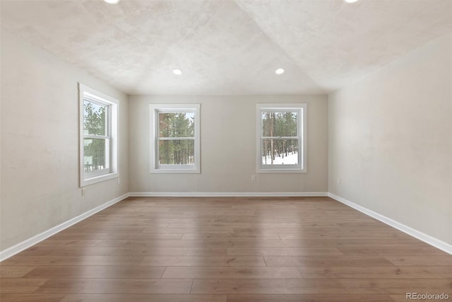 27987 Pine Grove Trl, Conifer, CO 80433 - empty room with recessed lighting, hardwood / wood-style floors, and baseboards
