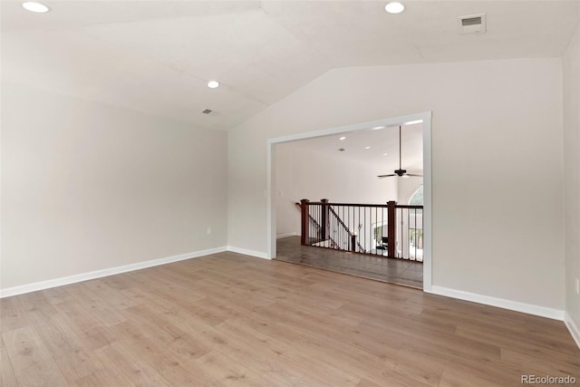 27987 Pine Grove Trl, Conifer, CO 80433 - unfurnished room with vaulted ceiling, light wood finished floors, ceiling fan, recessed lighting, and baseboards