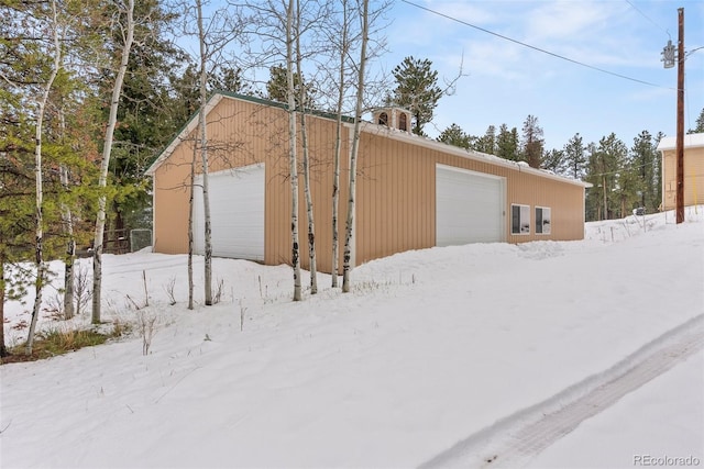 27987 Pine Grove Trl, Conifer, CO 80433 - view of snow covered structure
