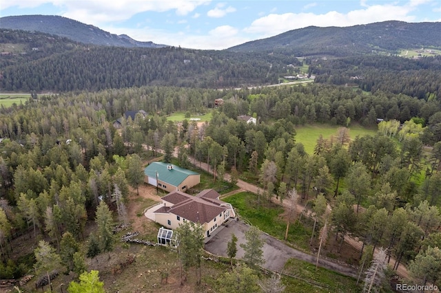 27987 Pine Grove Trl, Conifer, CO 80433 - aerial view of property and surrounding area featuring a mountain backdrop