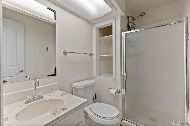 27987 Pine Grove Trl, Conifer, CO 80433 - bathroom featuring a stall shower and vanity