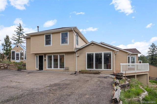 27987 Pine Grove Trl, Conifer, CO 80433 - rear view of house with a deck