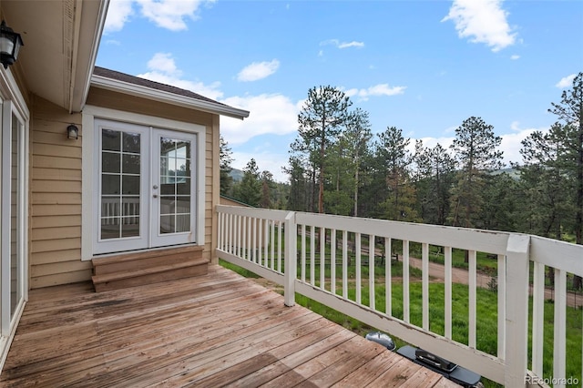 27987 Pine Grove Trl, Conifer, CO 80433 - wooden deck with french doors