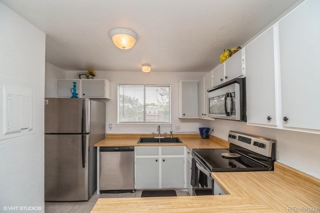 8654 Decatur St Unit 251, Westminster, CO 80031 - kitchen featuring appliances with stainless steel finishes, a sink, and electric panel
