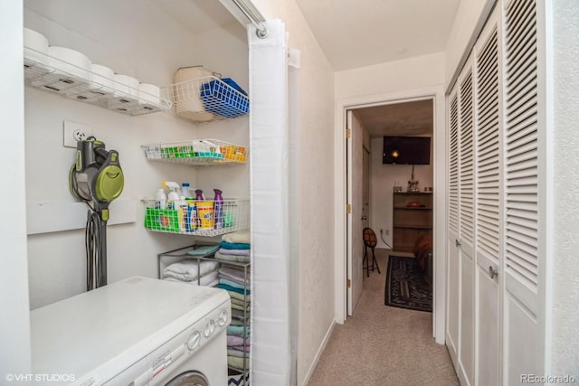 8654 Decatur St Unit 251, Westminster, CO 80031 - washroom featuring washer / dryer, light colored carpet, and baseboards
