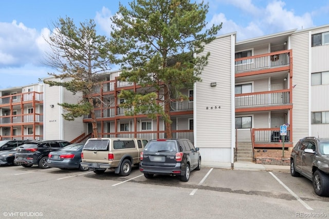 8654 Decatur St Unit 251, Westminster, CO 80031 - view of apartment building / complex featuring uncovered parking