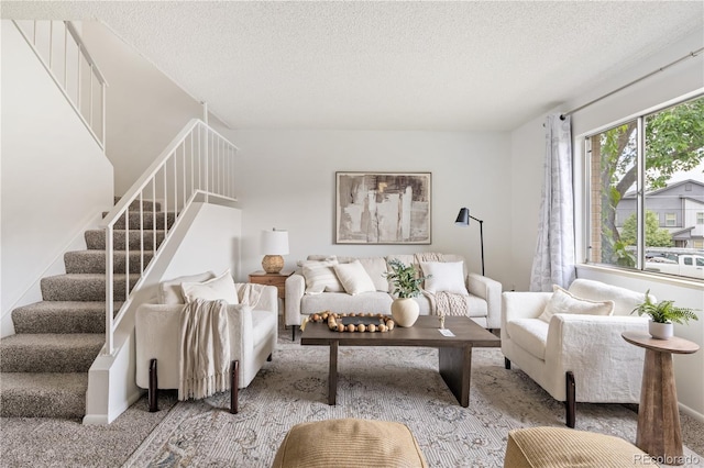 12522 W Virginia Ave, Lakewood, CO 80228 - carpeted living room with a textured ceiling and stairway