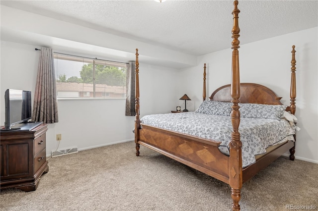 12522 W Virginia Ave, Lakewood, CO 80228 - bedroom with light colored carpet and a textured ceiling