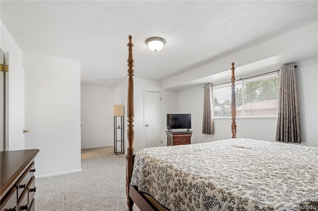 12522 W Virginia Ave, Lakewood, CO 80228 - carpeted bedroom with a textured ceiling