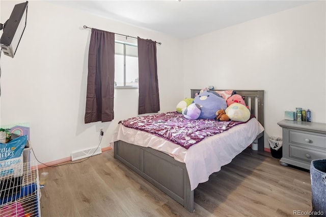 12522 W Virginia Ave, Lakewood, CO 80228 - bedroom featuring wood finished floors