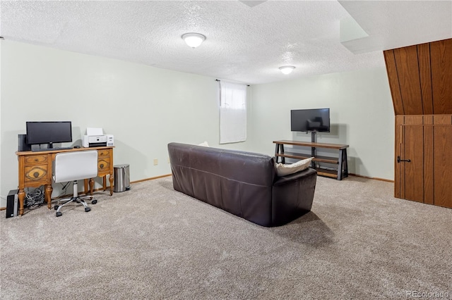 12522 W Virginia Ave, Lakewood, CO 80228 - living room featuring carpet floors, a desk, and a textured ceiling