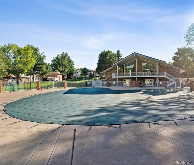 12522 W Virginia Ave, Lakewood, CO 80228 - view of swimming pool with a patio