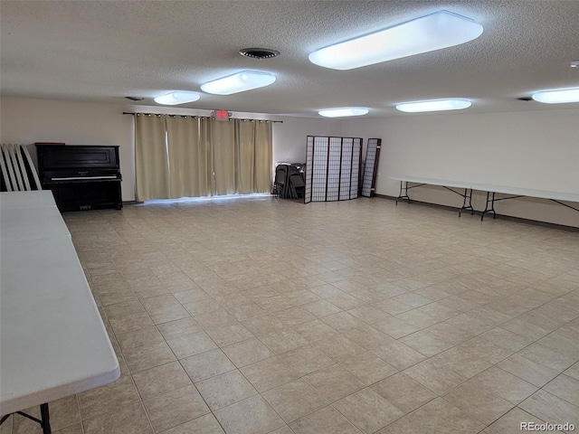 12522 W Virginia Ave, Lakewood, CO 80228 - miscellaneous room featuring a textured ceiling