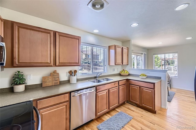 25792 E Cedar Pl, Aurora, CO 80018 - kitchen featuring dishwasher, electric range, a peninsula, light wood-style flooring, and recessed lighting