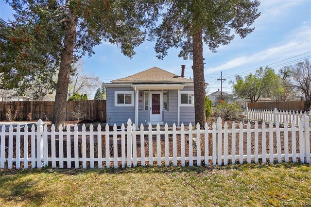 4290 S Cherokee St, Englewood, CO 80110 - view of front of house with a fenced front yard