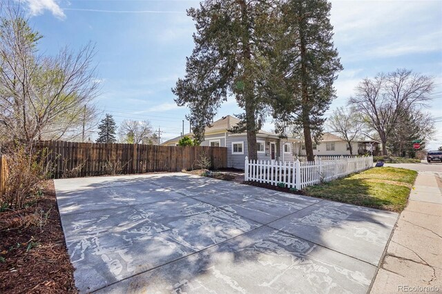 4290 S Cherokee St, Englewood, CO 80110 - view of patio with a fenced front yard