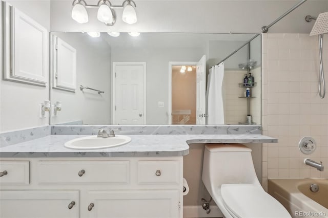 1818 S Quebec Way Unit 11-3, Denver, CO 80231 - bathroom with toilet, shower / bathtub combination with curtain, and vanity