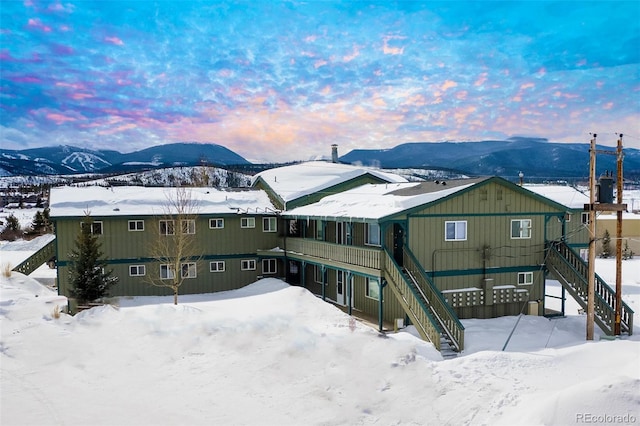 view of front of home with a mountain view