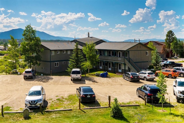 exterior space featuring a mountain view