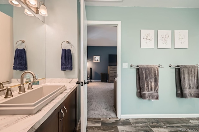 17509 E Kenyon Dr, Aurora, CO 80013 - bathroom featuring vanity and baseboards