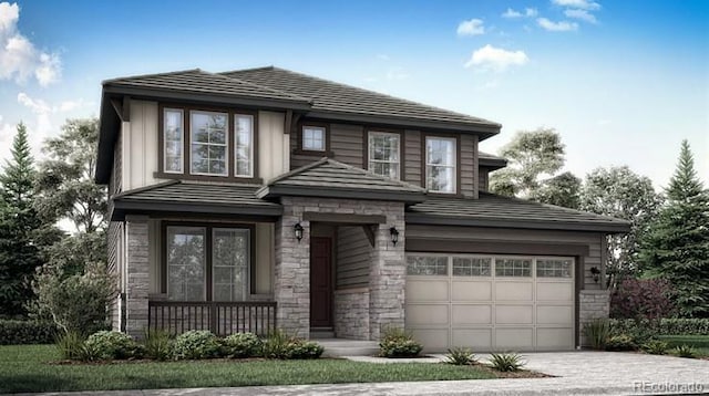 7440 S Yank Ct, Littleton, CO 80127 - prairie-style house featuring a garage, stone siding, and driveway