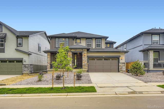 7440 S Yank Ct, Littleton, CO 80127 - view of front of house featuring stone siding, a garage, concrete driveway, and roof with shingles