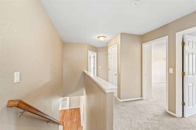 4960 Seton Pl, Colorado Springs, CO 80918 - hallway with an upstairs landing and light colored carpet