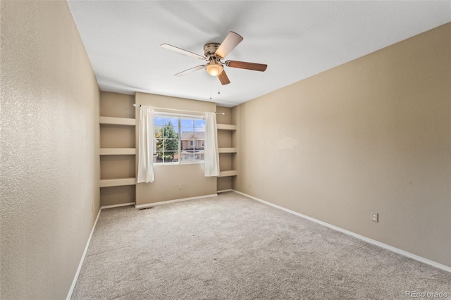 4960 Seton Pl, Colorado Springs, CO 80918 - carpeted spare room featuring ceiling fan and a textured wall
