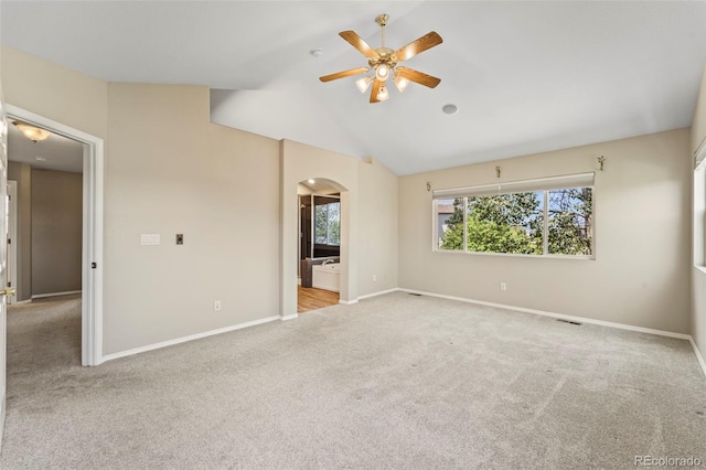 4960 Seton Pl, Colorado Springs, CO 80918 - carpeted empty room featuring arched walkways, a ceiling fan, and lofted ceiling