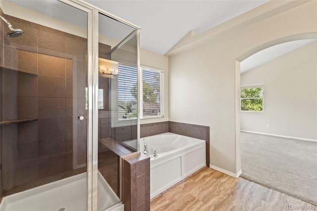 4960 Seton Pl, Colorado Springs, CO 80918 - full bathroom featuring lofted ceiling, a stall shower, and a bath