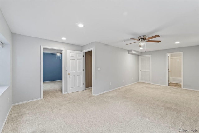 4960 Seton Pl, Colorado Springs, CO 80918 - unfurnished bedroom featuring a spacious closet, recessed lighting, light carpet, a ceiling fan, and ensuite bath